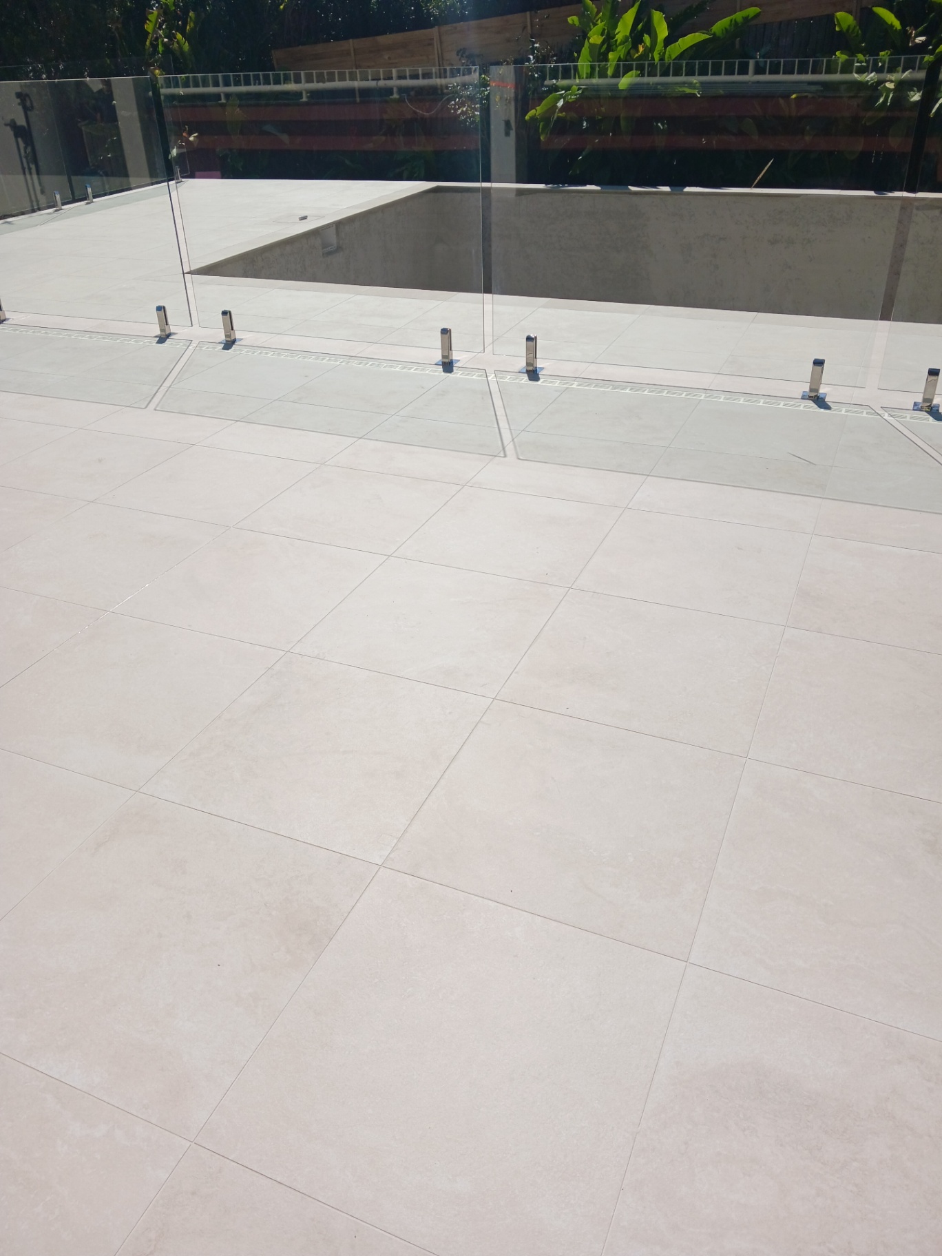 Pool deck tiling by Maroochydore Tiling